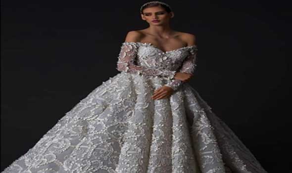   مصر اليوم - موديلات لتصميمات فساتين زفاف بتنورة إضافية 2022