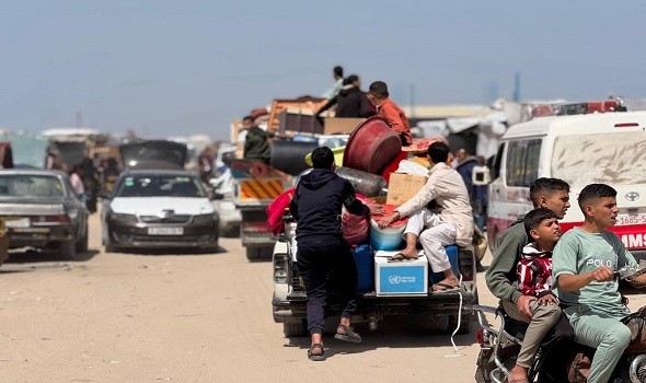   مصر اليوم - نازحون بغزة يعيشون بين الموتى